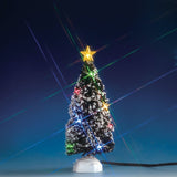 Lemax village accessory designed to look like a snow-covered tree that has multi-colored lights on it and a yellow star on top.