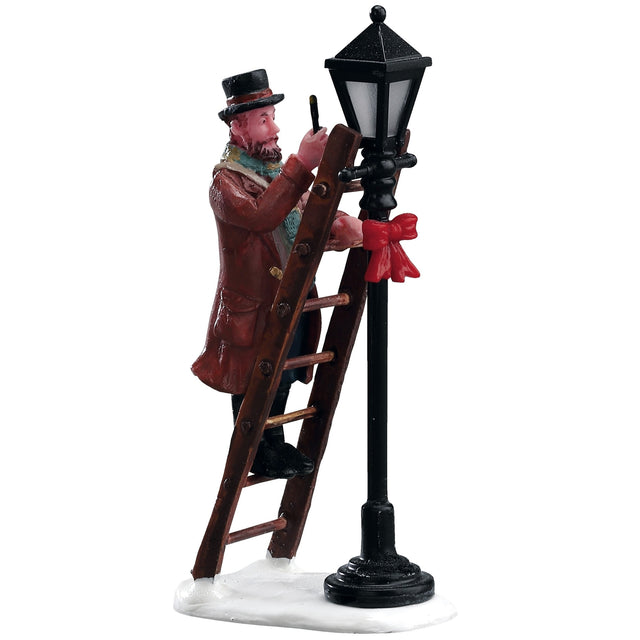 Polyresin figurine for a Lemax display. Designed to look like a man on a ladder lighting the light in a lamppost.