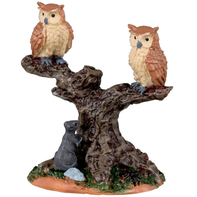 Resin village accent for a Lemax display. Designed to look like a bare tree with two owls sitting on the branches. There's a rat and a spider at the base.