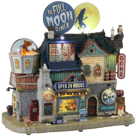 Resin lighted building for a Spooky Town Lemax display. Designed to look like a very large diner. There's a giant, circular sign on the roof that reads "THE FULL MOON DINER" and next to it is a round, yellow moon with a silhouette of a werewolf on it. There's a see through globe with a wolf inside and a werewolf eating inside the diner. There's garbage and bones on the sidewalk.