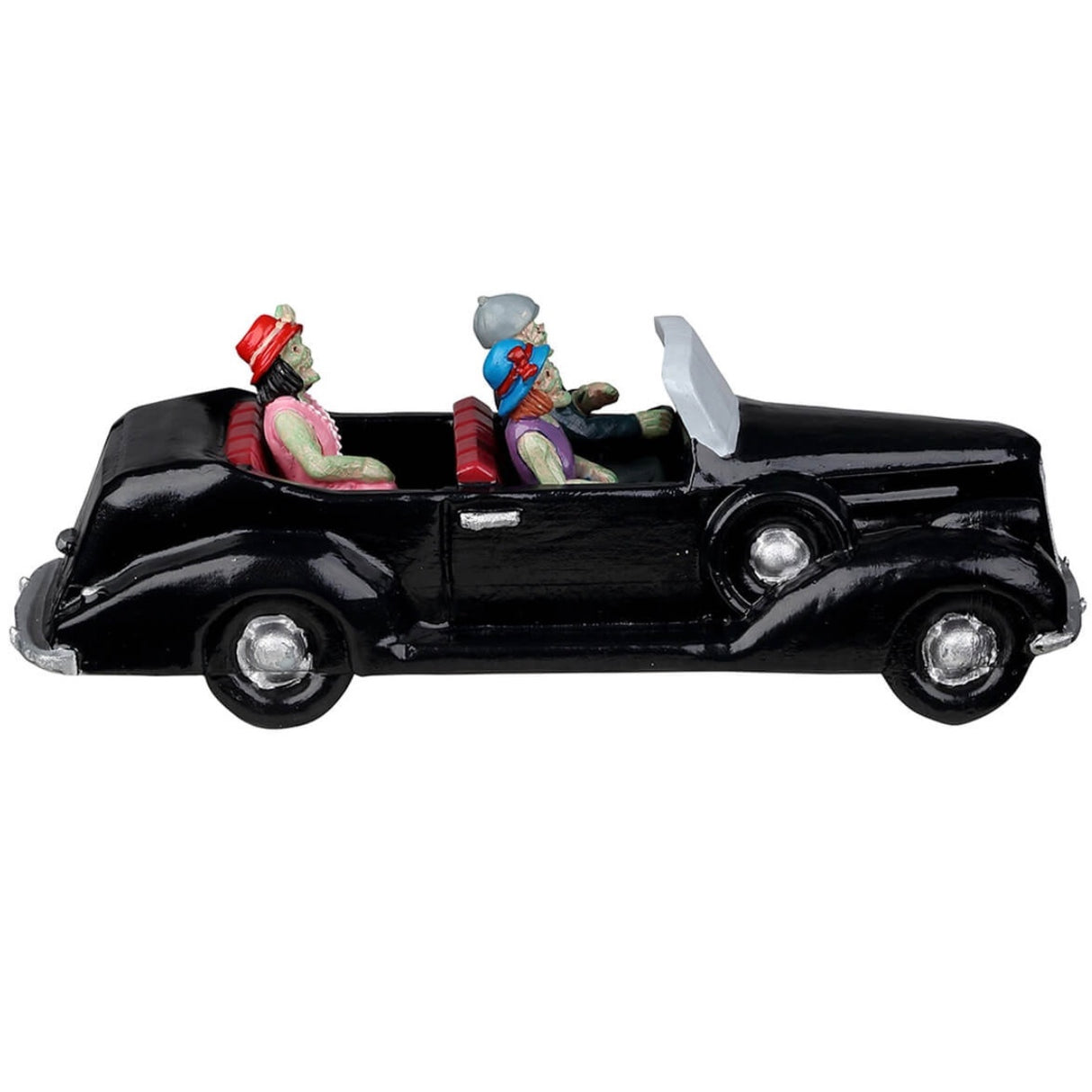 Resin village accent for a Lemax Spooky Town display. Designed to look like three people in a shiny, black convertible car. They're all dressed up. The driver is wearing a suit and a gray hat. The woman in the passenger seat is wearing a purple dress and a blue hat. The woman in the backseat is wearing a pink dress, a pearl necklace and a red hat. Their skin is green.