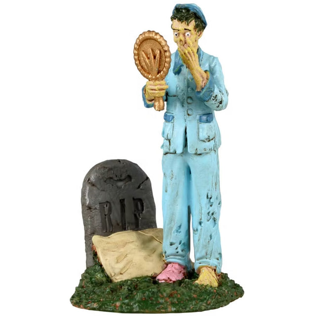 Resin figurine for a Lemax display. Designed to look like a zombie that just woke up from a grave. He's wearing pajamas and looking into a mirror.