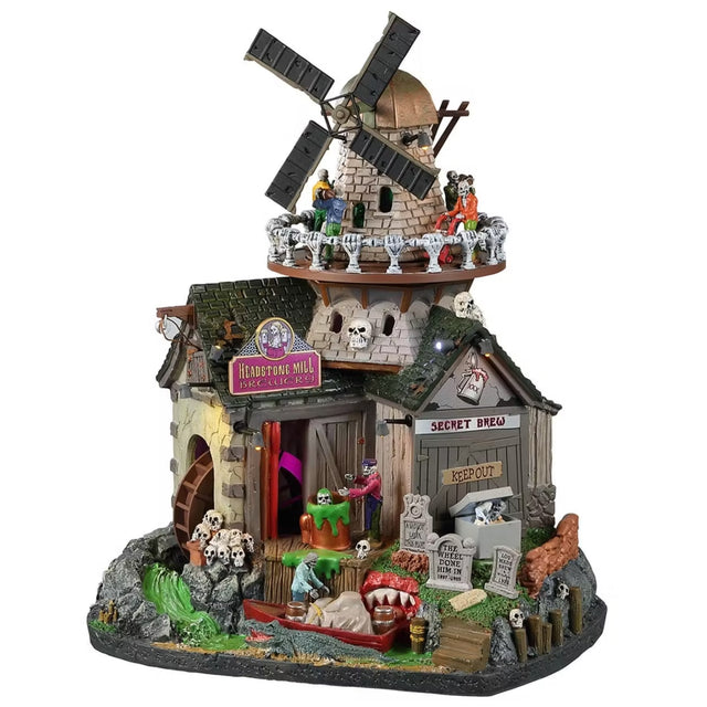 Resin building for a Lemax display. Designed to look like a creepy cabin connected to windmill and a water wheel. There are tombstones and bone accents.