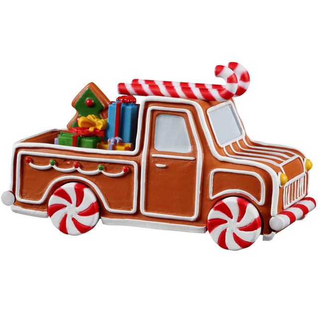 Resin village accent for a Lemax display. Designed to look like a truck made out of gingerbread and peppermint candies.