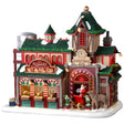 Resin lighted building for a Lemax display. Designed to look like Santa's Reindeer Stables. There are reindeer eating and elves helping Santa Claus get his sleigh ready.