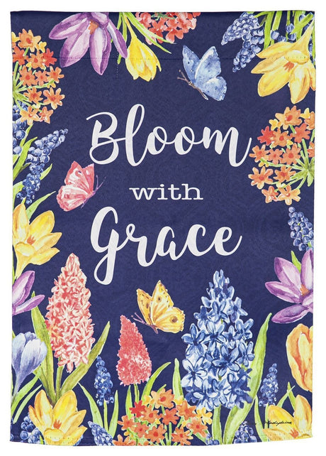 A royal blue flag that reads "Bloom with Grace" and features a bunch of different colored flowers and butterflies