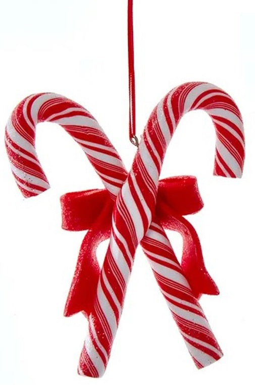 Ornaments shaped like candy canes criss-crossing.