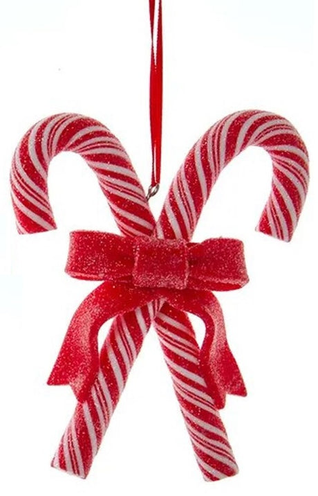 Ornaments shaped like candy canes criss-crossing.