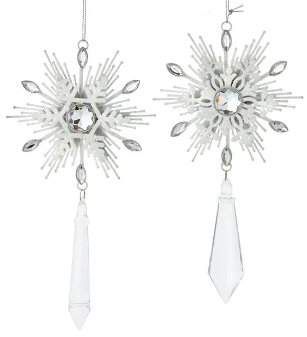 Snowflake shaped ornaments with hanging diamond accents.