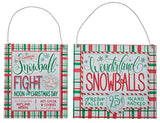 Festive sign decorations for winter. Both signs have a white, green and red plaid border and a mixture of cursive and sans serif fonts.
