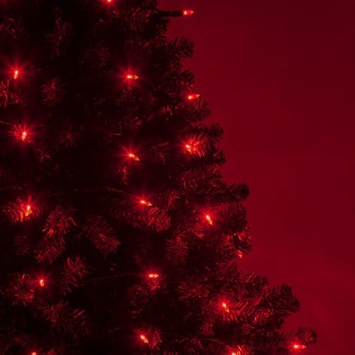 Mini red LED lights on a Christmas tree.