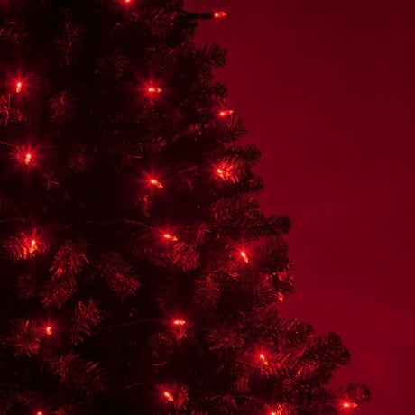 Mini red LED lights on a Christmas tree.