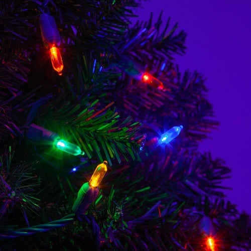 Mini multi-colored LED lights on a Christmas tree.