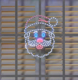 LED singing Santa decoration.
