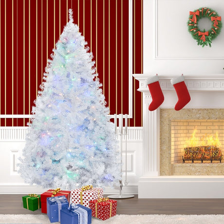 White artificial tree pre-lit with multi-colored lights.