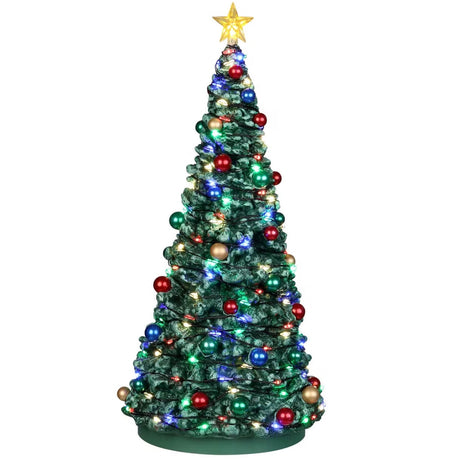 Resin village accent for a Christmas Lemax display. Designed to look like a tall, heavily decorated Christmas tree. There's a lit star at the top and strings of lights. The ornaments are red, green, blue and gold.