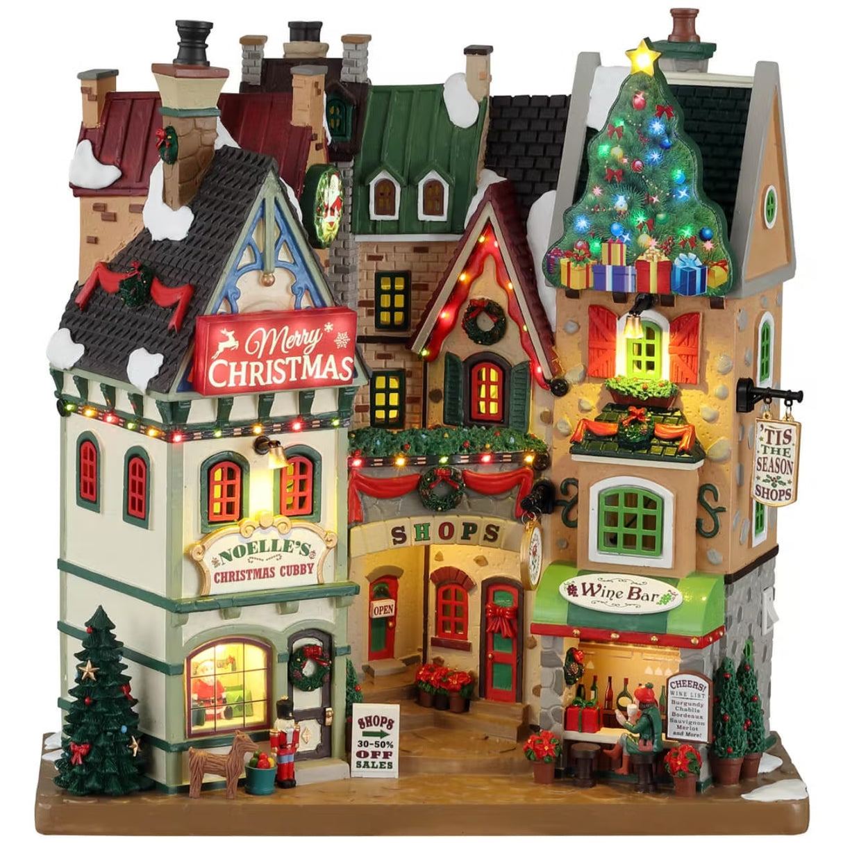Polyresin building facade for a Lemax display. Designed to look like a collection of store fronts that are decorated for Christmas. Santa is in the front window of one of the stores. There's a person sitting outside of the Wine Bar.