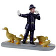 Resin figurine for a Lemax display. Designed to look like a police officer using his whistle to stop traffic for a family of birds that are crossing the road.