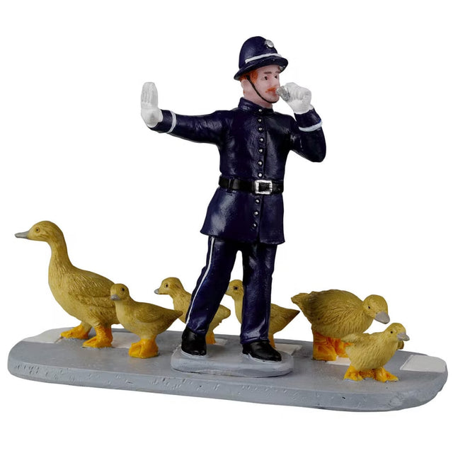 Resin figurine for a Lemax display. Designed to look like a police officer using his whistle to stop traffic for a family of birds that are crossing the road.