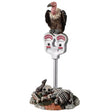 Plastic figurine for a Lemax display. Designed to look like a vulture standing on top of a parking meter. There are bones and a rat at the base.