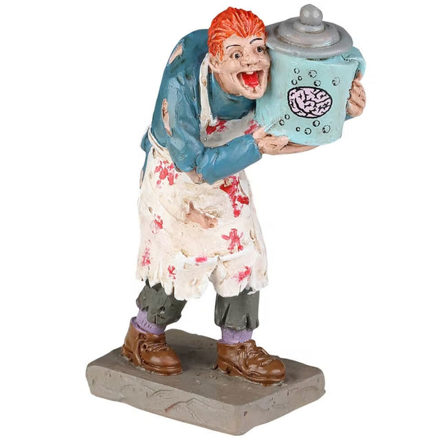 Polyresin figurine for a Lemax display. Designed to look like a zombie wearing a bloody apron and holding a jar of brains.