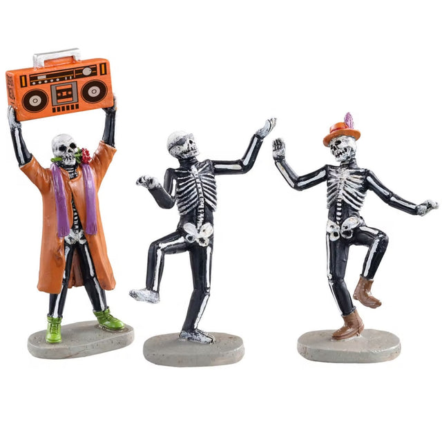 Polyresin figurines for a Lemax Spooky Town display. Designed to look like three skeletons dancing. One skeleton is wearing an orange trench coat with a purple scarf and lime green shoes. He's holding an orange radio and has a red rose in his mouth. The middle skeleton has sunglasses on. The other skeleton is wearing an orange hat with a feather in it and is wearing brown boots.