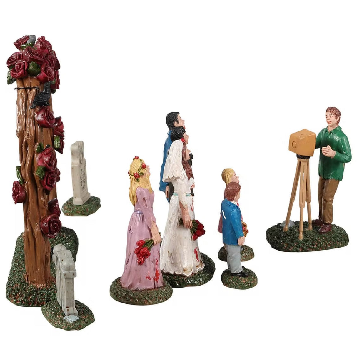 Resin figurines for a Lemax display. Designed to look like a zombie family getting their picture taken underneath a wooden arch with roses all over it. There's a bride, a groom, a maid of honor, a best man, a young boy and a young girl.