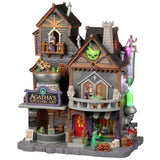 Resin building for a Lemax display. Designed to look like a Victorian-era building with skeleton accents, pumpkins, witches and frog statues.