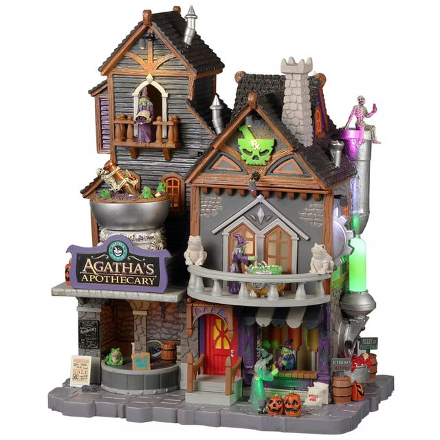 Resin building for a Lemax display. Designed to look like a Victorian-era building with skeleton accents, pumpkins, witches and frog statues.