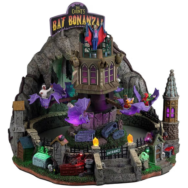 Resin carnival ride for a Lemax display. Designed to look like a bat cave. The ride's carts are shaped like purple bats.