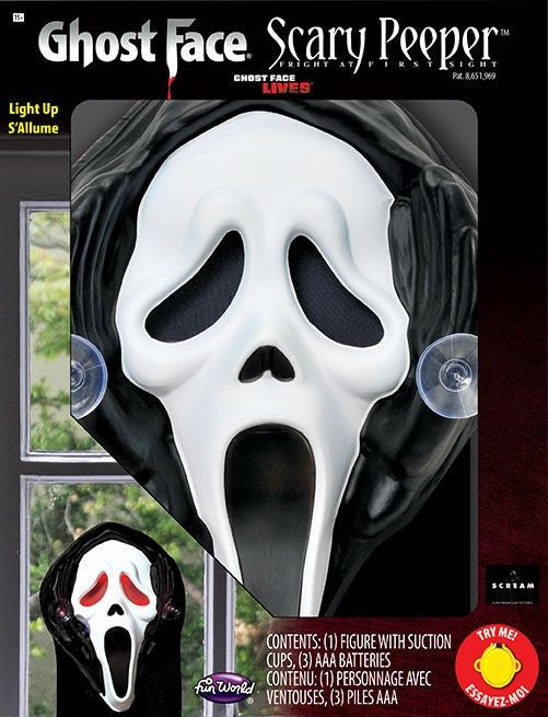 Decoration designed to be hung in your window or on a glass door. Looks like Ghost Face is peeping into your home, or peering out.