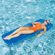 Blue foam pool mattress that rolls up.