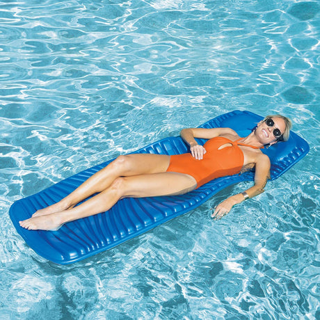 Blue foam pool mattress that rolls up.