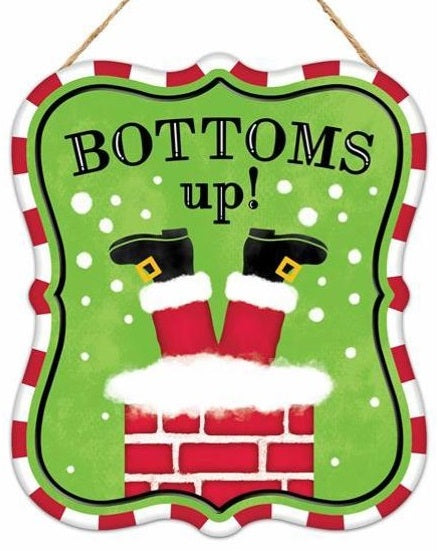 Sign has a red and white striped border with a lime green background. The sign reads "BOTTOMS UP!" and features Santa's legs sticking out of a chimney.
