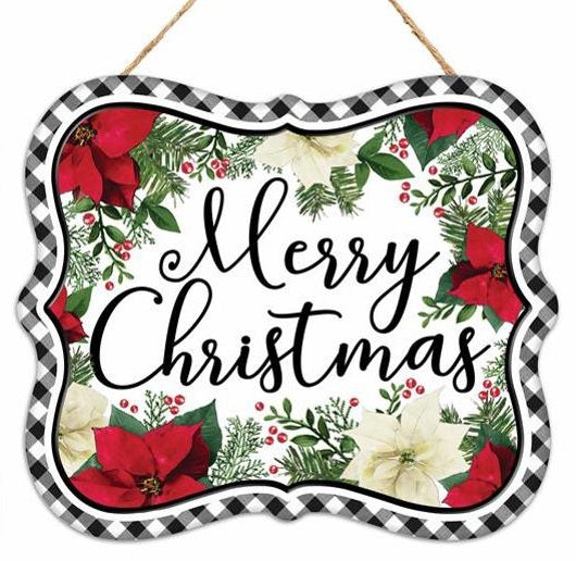 This sign reads "MERRY CHRISTMAS" in a black cursive font. The border is black and white buffalo check. The background on the sign features red red poinsettias, holly leaves, berries and white poinsettias.