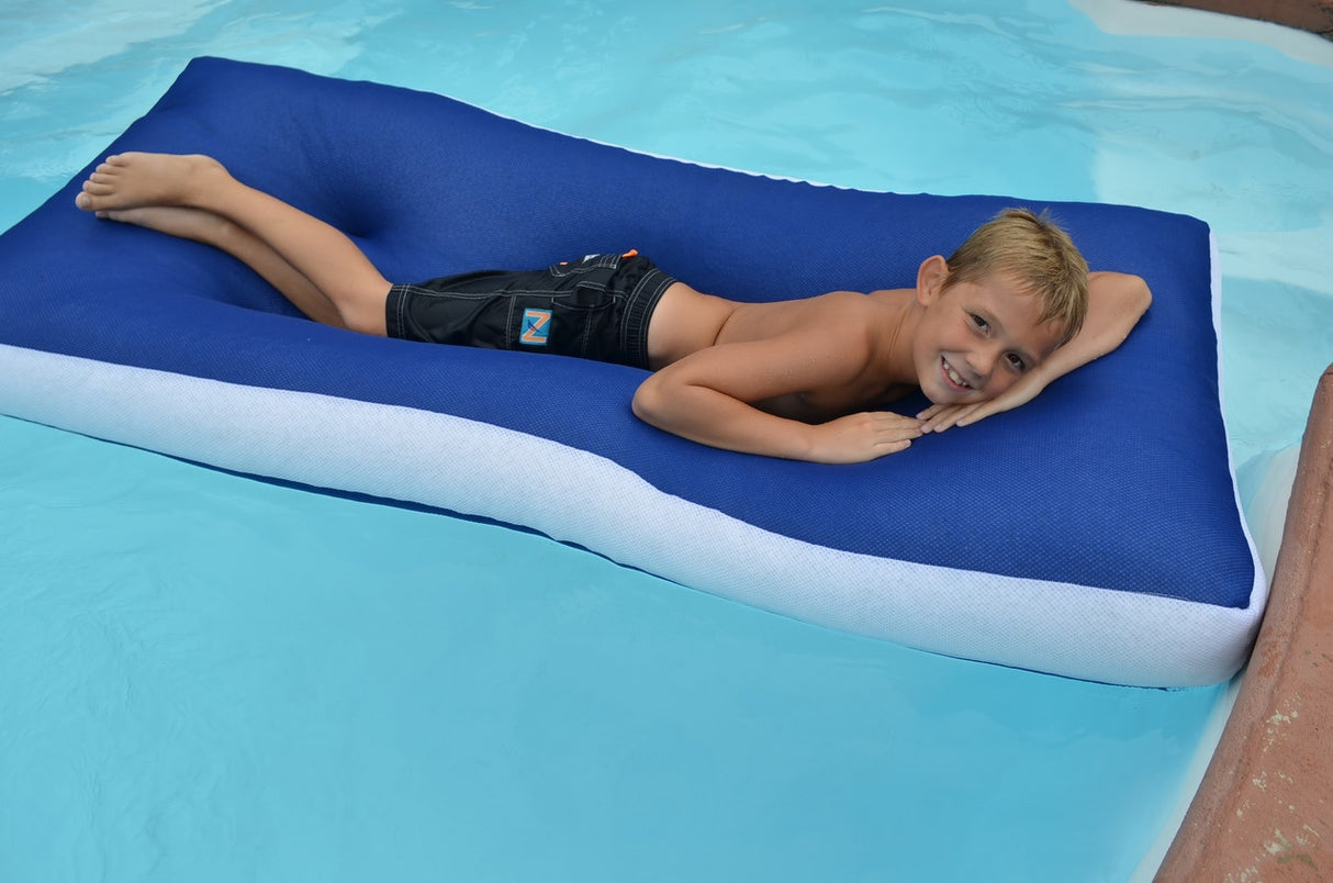 Large blue inflatable pool mattress with a white border.