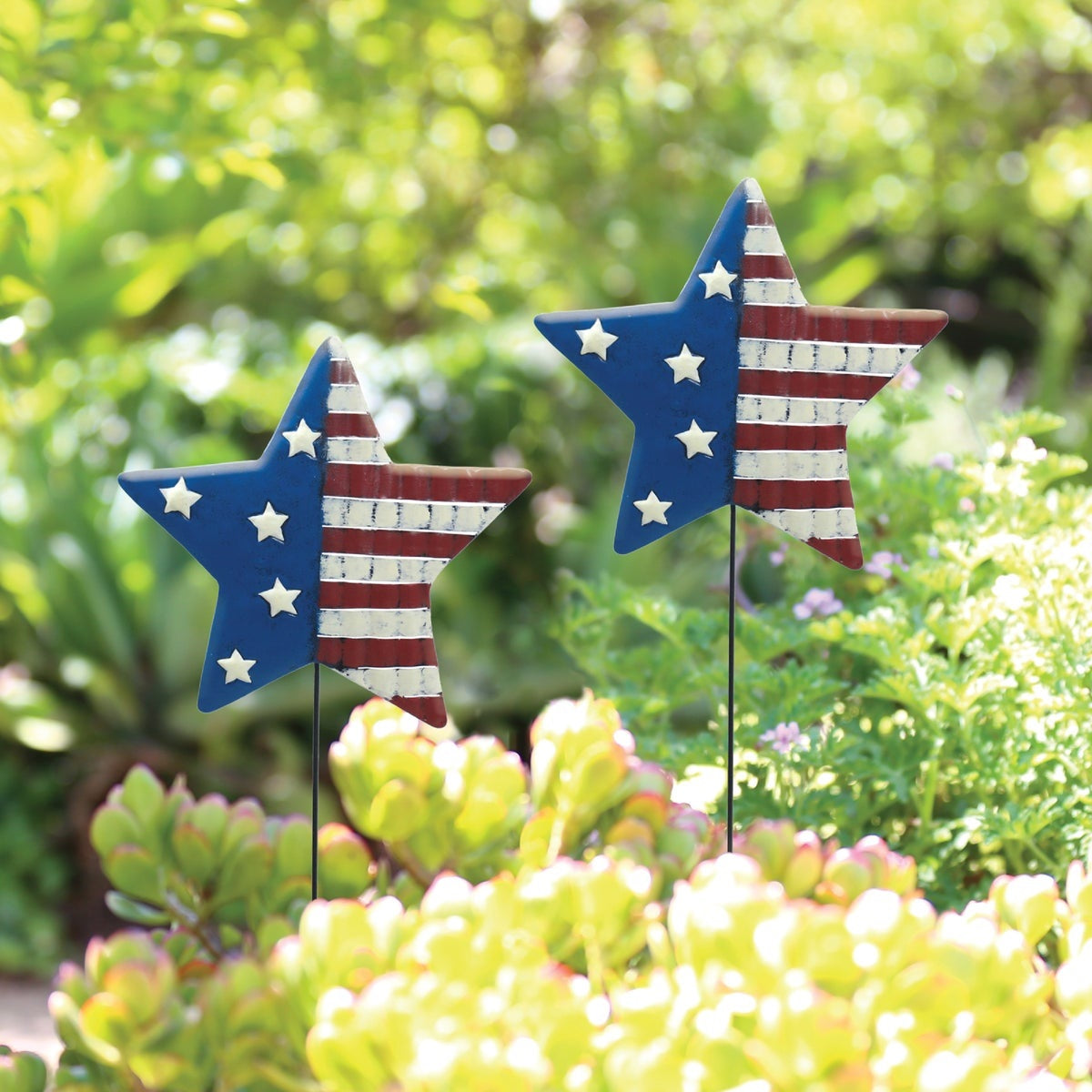 Lawn stake shaped like a star. The left side of the star is blue with white stars. The right side of the star is red and white striped.