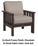 A brown armchair with tan cushions