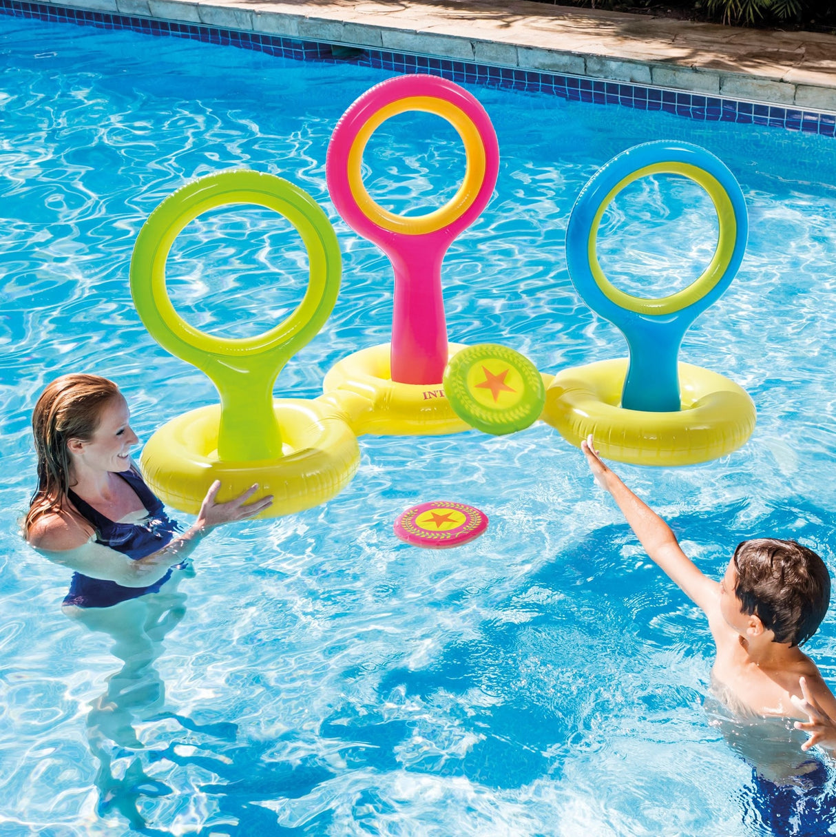Three circular floating inflatable goals. The game is to throw the inflatable discs through the goals.