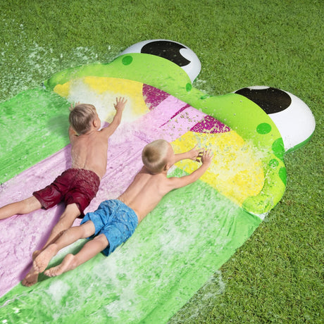 A water slide shaped like a frog. There are three lanes for racing.