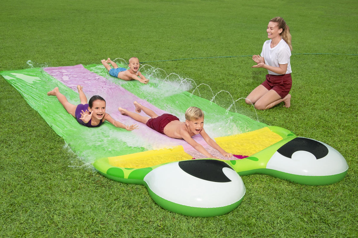 A water slide shaped like a frog. There are three lanes for racing.
