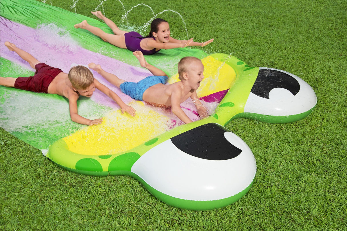 A water slide shaped like a frog. There are three lanes for racing.