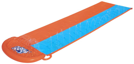A slip n slide with two lanes that lead into a splash pad.