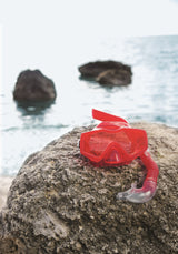 Swimming mask and snorkel set. There are two color options: one is red and one is black.