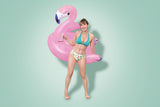 A pink pool inflatable shaped like a flamingo.