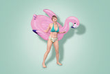 A pink pool inflatable shaped like a flamingo.