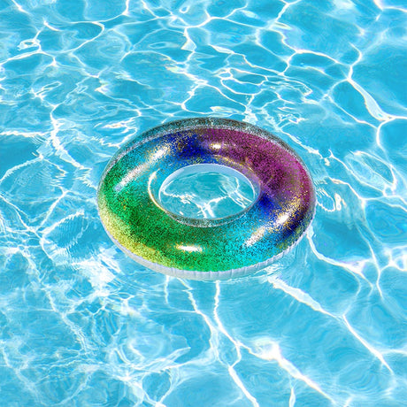 A gold-glitter infused rainbow inner tube.