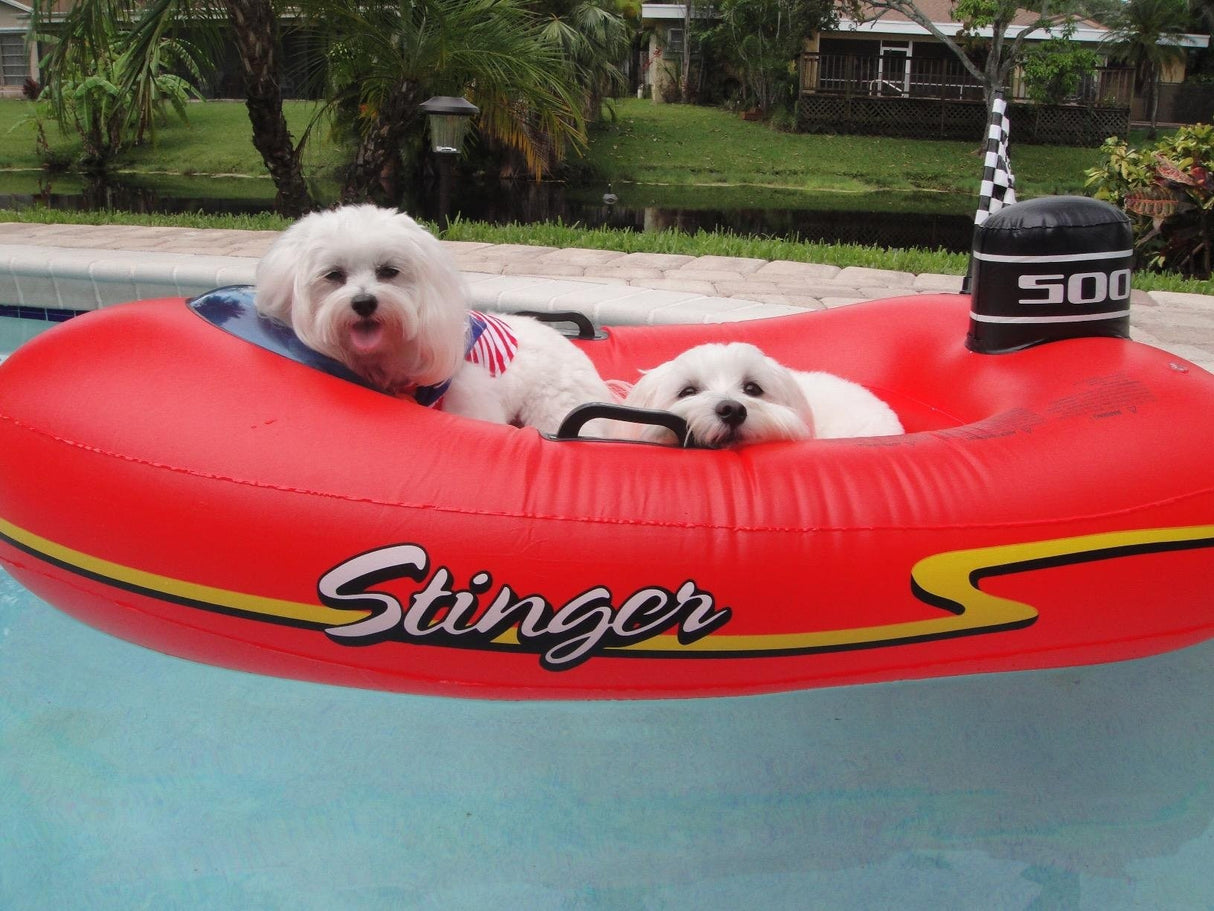 Pool float for kids shaped like a red speedboat.