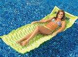 Inflatable pool mattresses. There are three color options: yellow, pink or lime green.