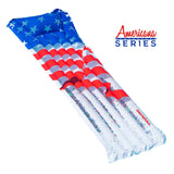 This image shows the pool float on a white background. The pool float is designed to look like an American flag. The top part is blue with white stars, the middle part has red stripes and the bottom part is white with multi-colored glitter inside.